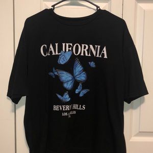 Oversized Black Butterfly Beverly Hills Shirt From Shein, size XS